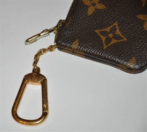 louis vuitton key change purse|authentic louis vuitton key chains.